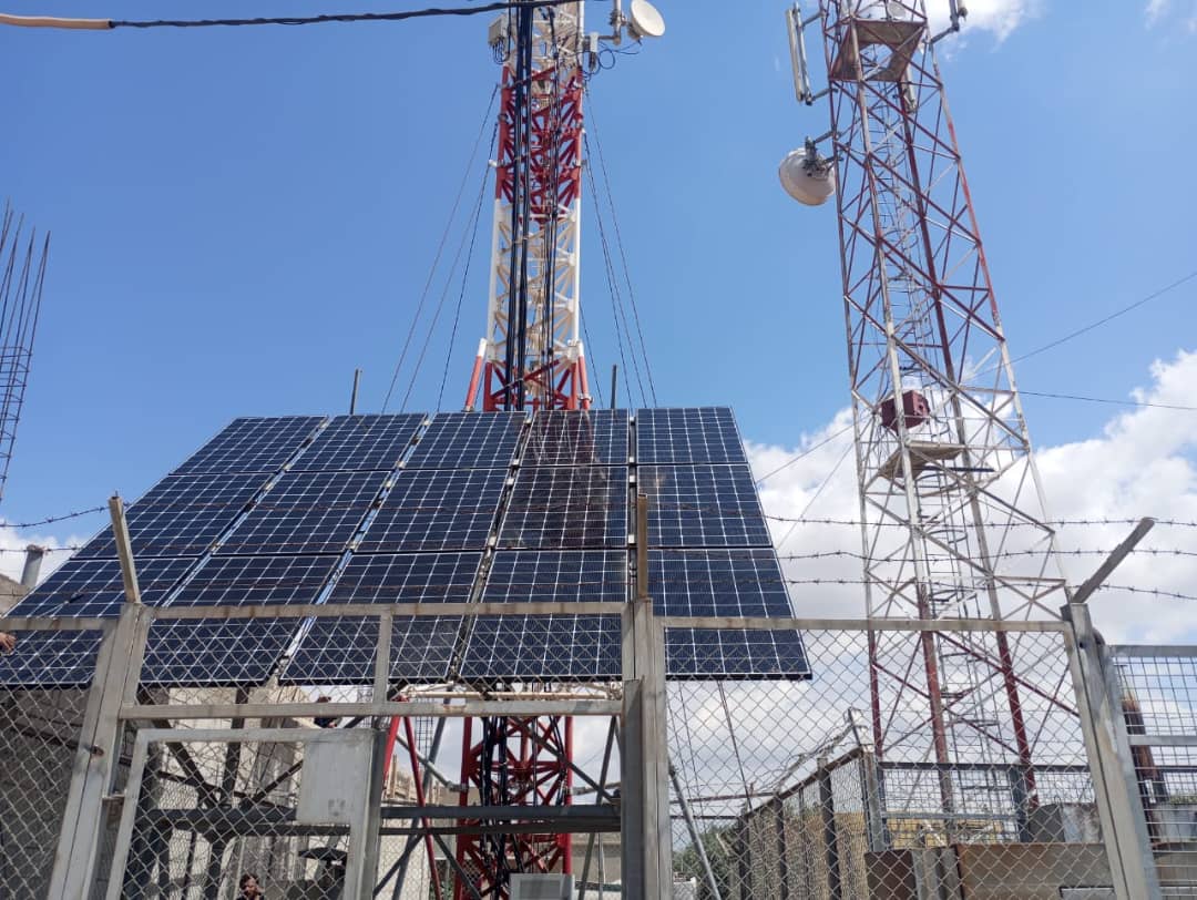 Twin towers with solar arrays and microwave links